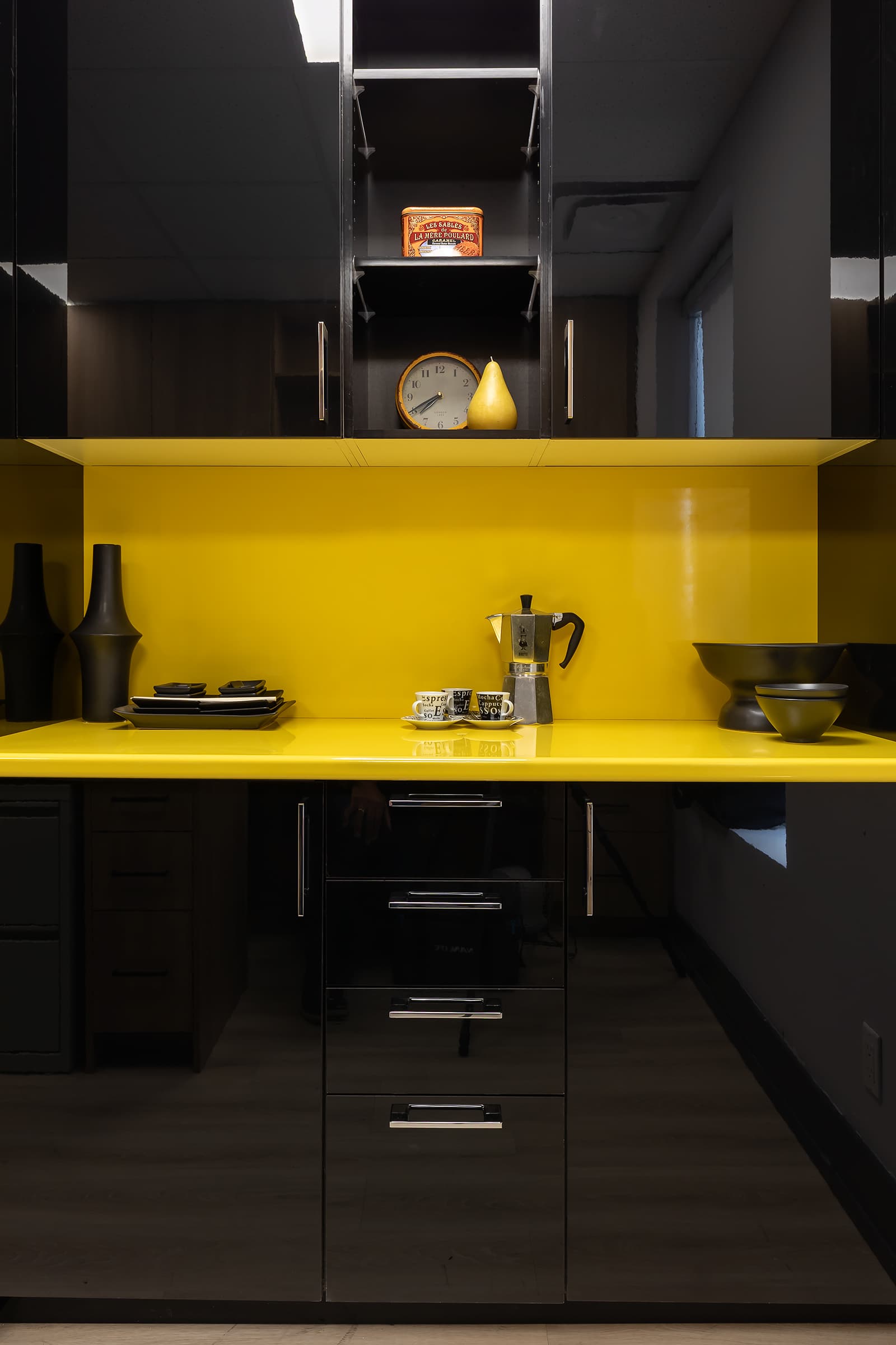 black and yellow cabinetry with high gloss finish vertical shot