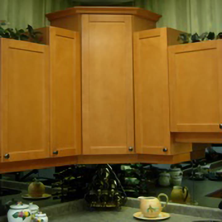 wood angled upper cabinetry